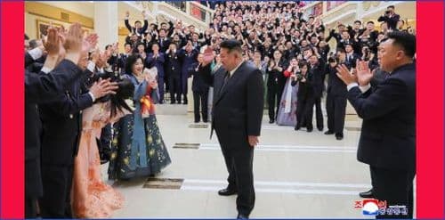 Respected Comrade Kim Jong Un Has Photos Taken with Creative Workers and Artistes of National Symphony Orchestra Greeting Its 80th Founding Anniversary