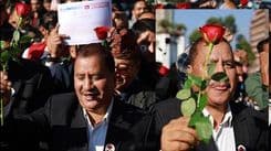 बन्दुक बोक्ने हातमा गुलाफ